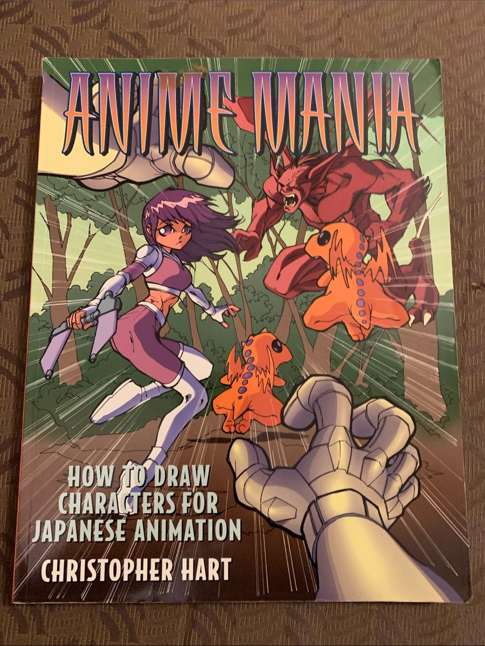 Anime How-To Drawing Book with Cartoon Laptop Graphic